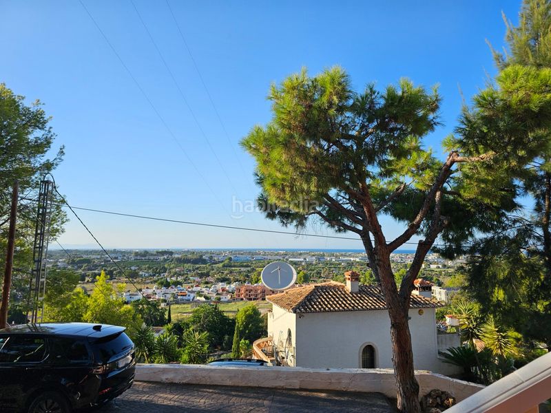 Foto 91c5f6e1-1f57-4e4b-91e8-ce7cd5926f04. Casa adossada amb calefacció aparcament piscina a Dénia