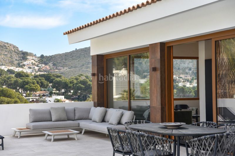 Foto 9e885116-e55c-4e86-898a-997a2b6e741d. Chalet mit parking pool in El Portet-Pla del Mar Moraira