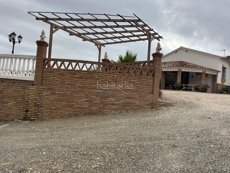 Foto ee80893e-22ef-4c69-b139-2b200dde5b93. Lloguer masia amb xemeneia aparcament piscina a Riogordo