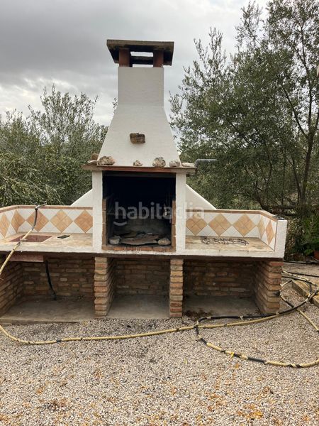 Foto f81eab17-6a79-4a7d-8d47-e39a431eb7f1. Lloguer masia amb xemeneia aparcament piscina a Riogordo