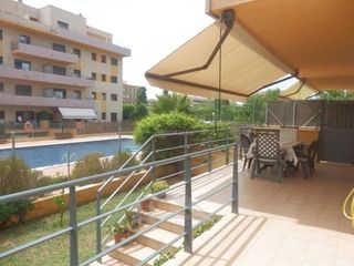 Apartament a Barenys. Espectacular planta baja con piscina y parking en barenys salou