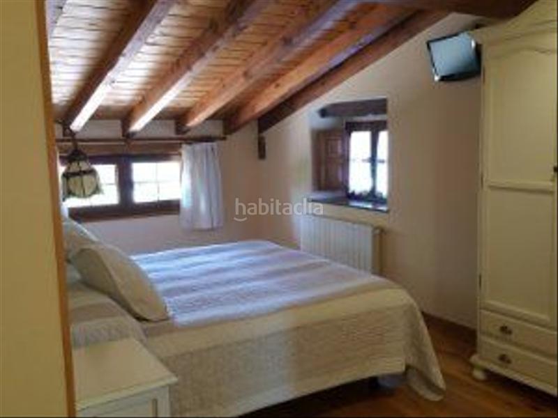 Foto fe7bee23-5462-4000-9e19-430673a26f92. Casa en Rozas de Valdearroyo (Las)