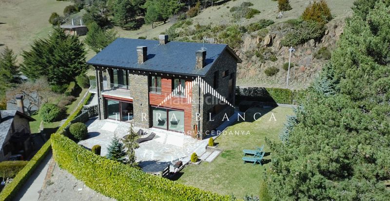 Foto b845d5c8-e08c-4a64-97ef-4099a00fbb95. Casa amb xemeneia aparcament a Molina (La)