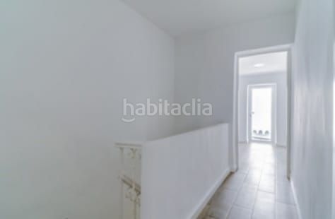 Foto c3a7ade2-61df-44e5-941d-67938ce4f9e3. Casa adossada amb calefacció a Coín