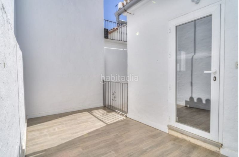 Foto dd3eef5e-5a4e-4e10-a688-b895690e05d7. Casa adossada amb calefacció a Coín