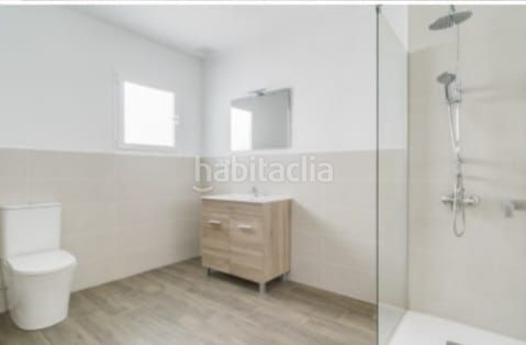 Foto f59a0f5c-58b2-4418-a4ba-ca19333f0feb. Casa adossada amb calefacció a Coín
