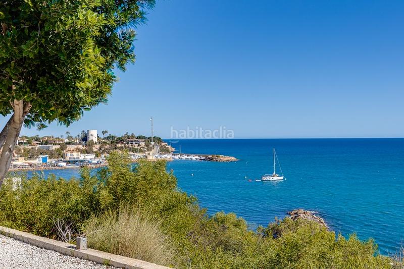 Foto 15e5d626-82ab-4edc-ad37-532ea55e8739. Casa chalet de estilo mediterráneo en Cabo Roig a 300 m de la caleta en Orihuela
