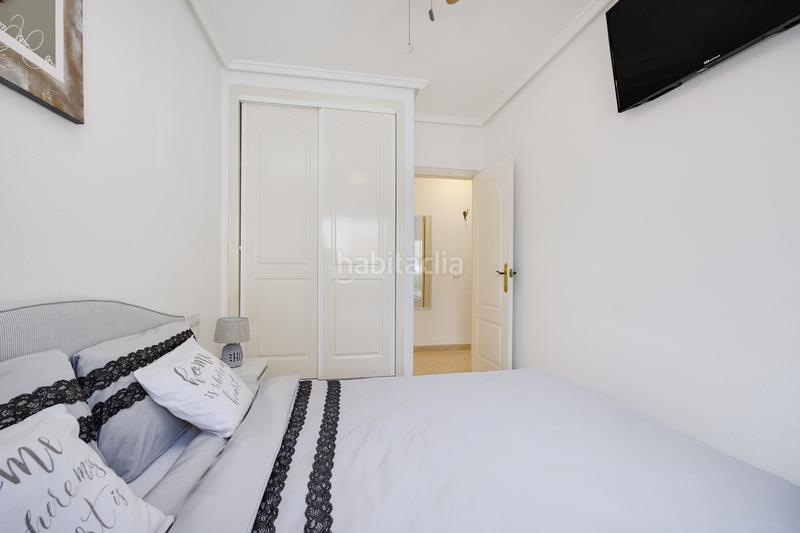 Foto 14689f5c-139b-47fa-842d-278d2b75c6c9. Apartamento planta baja con jardín privado y piscina comunitaria en la fiesta quesada en Rojales