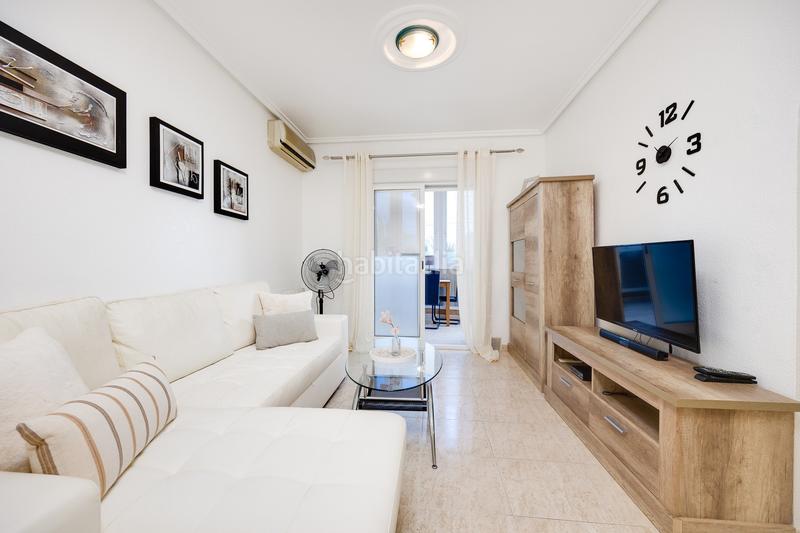 Foto 6b967020-bd97-425c-9482-04662301f0c5. Apartamento planta baja con jardín privado y piscina comunitaria en la fiesta quesada en Rojales