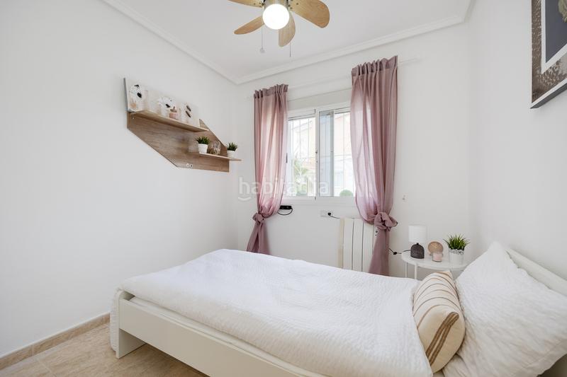Foto 898c602c-4ab2-4810-b08b-7e07060406e6. Apartamento planta baja con jardín privado y piscina comunitaria en la fiesta quesada en Rojales