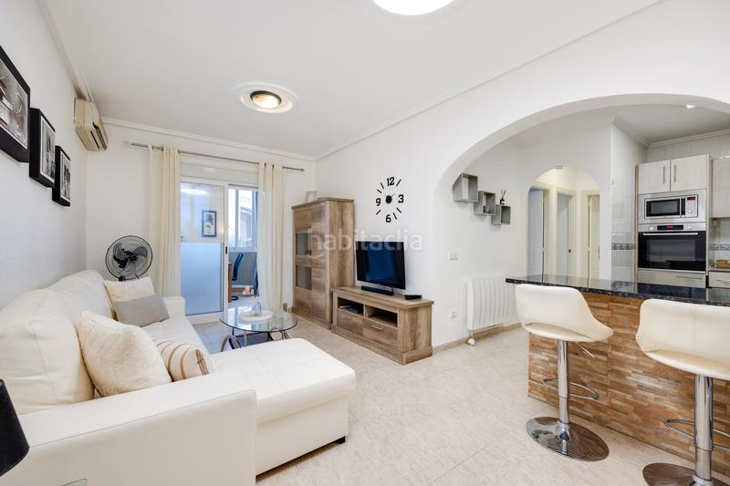 Foto 9407b5b6-907a-4514-8f94-a029ccb96ca9. Apartamento planta baja con jardín privado y piscina comunitaria en la fiesta quesada en Rojales