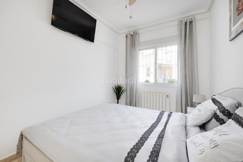 Foto ab3f0a04-680e-48df-abb9-c7a4bbd49736. Apartamento planta baja con jardín privado y piscina comunitaria en la fiesta quesada en Rojales