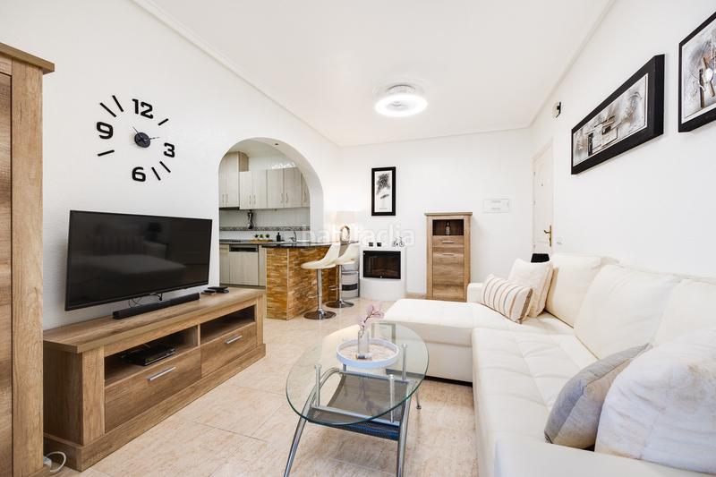 Foto cdcf8bde-4589-49c5-b672-a9a8094c5cc5. Apartamento planta baja con jardín privado y piscina comunitaria en la fiesta quesada en Rojales