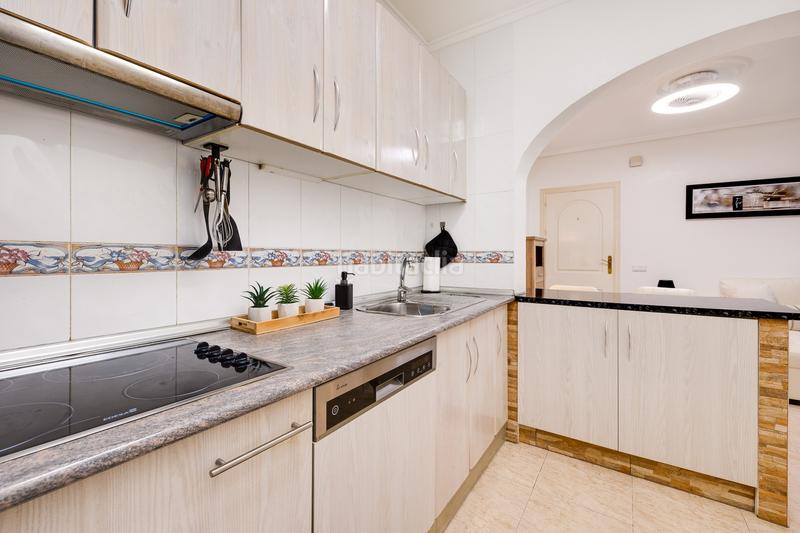 Foto ef605de2-c51a-463d-855e-04d0ba4c854e. Apartamento planta baja con jardín privado y piscina comunitaria en la fiesta quesada en Rojales
