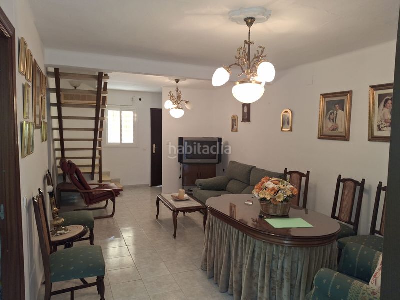 Foto 295f201e-62e5-4c6e-9e76-bdde06579883. Casa aparellada a calle rosal 9 a Villaverde del Río