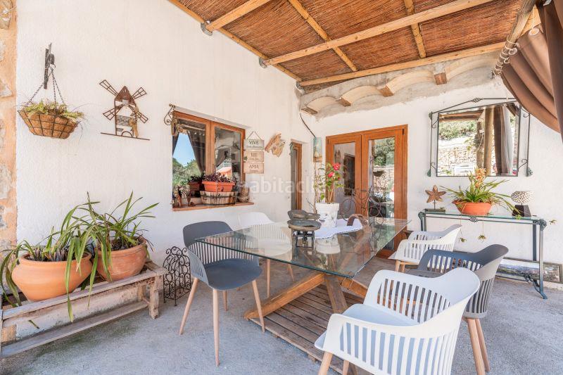 Foto b43fe7a2-3e77-461b-b90c-cc6ae34797c2. Masia amb xemeneia aparcament a Zona d´Interior Son Servera