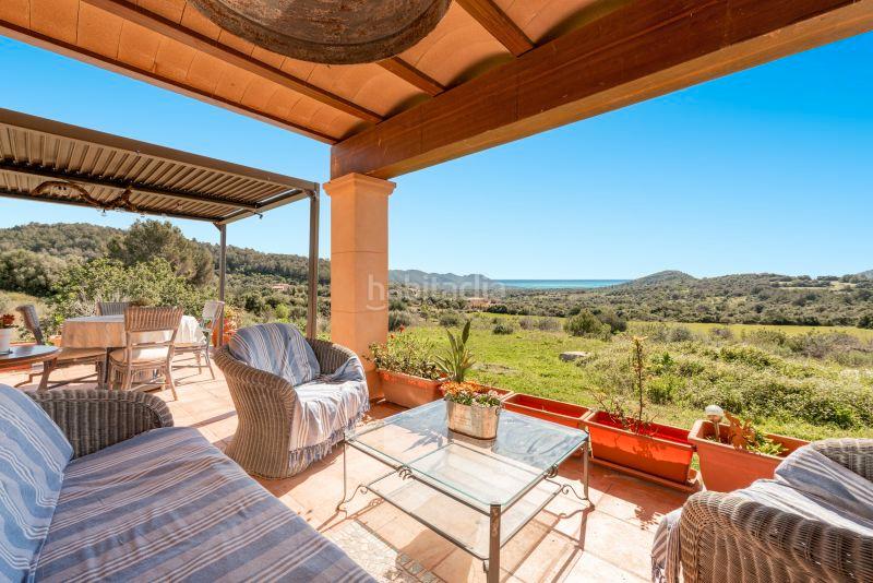 Foto cbf88fb4-2e7b-4372-9033-480372c66ee8. Masia amb xemeneia aparcament a Zona d´Interior Son Servera