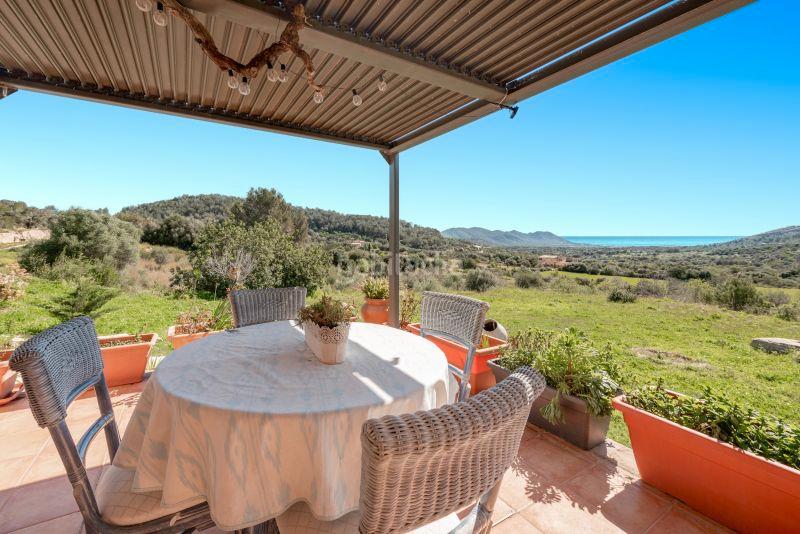 Foto cdb254dd-182e-4d63-ae3f-01c6aef2bef5. Masia amb xemeneia aparcament a Zona d´Interior Son Servera