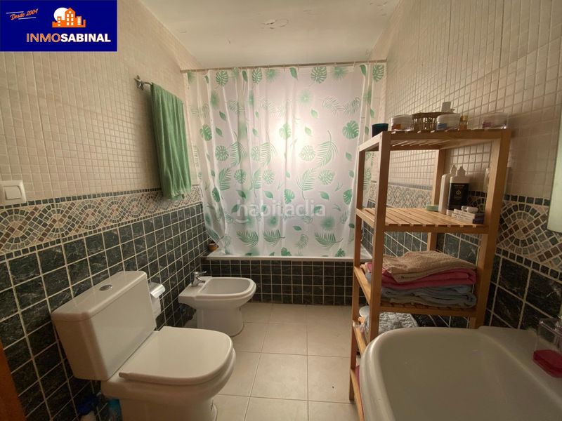 Foto 88f6efdb-6a73-4494-a93a-23799193a06c. Casa adossada amb calefacció aparcament piscina a Roquetas de Mar