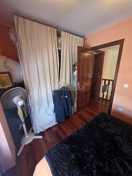 Foto 57cb7562-8c37-4390-86fe-59381f0fd217. Casa adossada amb calefacció aparcament a Reocín