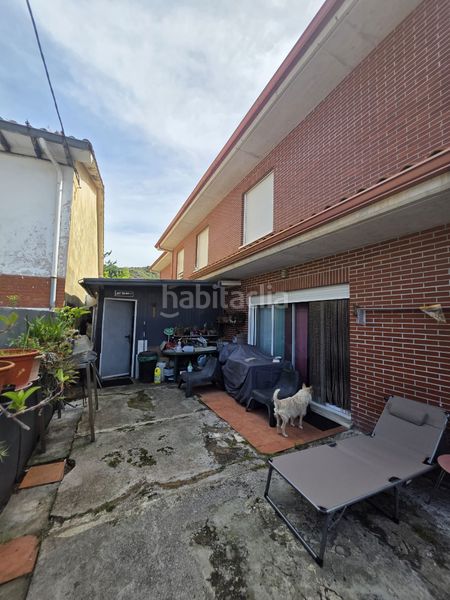 Foto c98d967c-3da1-4976-b6de-d9d7bfbf079f. Casa adossada amb calefacció aparcament a Reocín