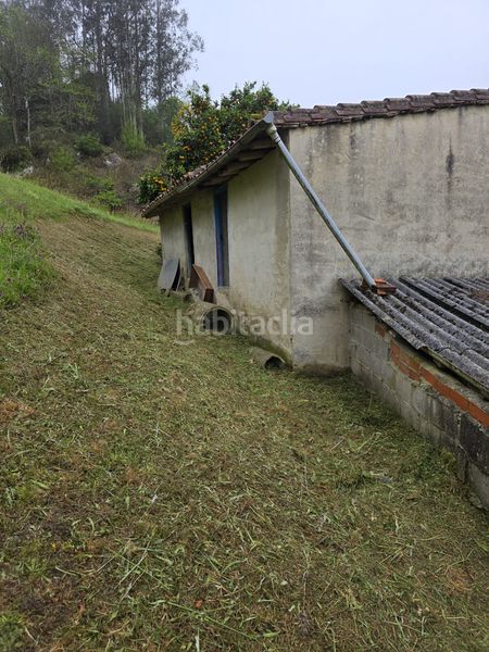 Foto ffc77446-2177-434a-877a-ad36643f8949. Casa adossada amb xemeneia calefacció aparcament a Valdáliga