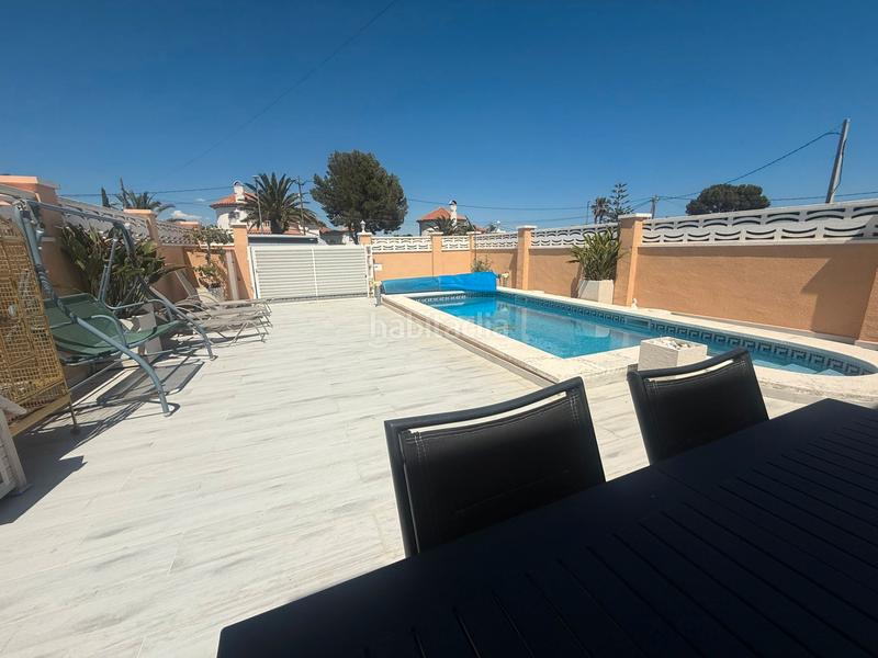 Foto 1e432ba1-5120-4052-a7d0-13dd1619a726. Chalet with fireplace heating parking pool in Centre Miami Platja