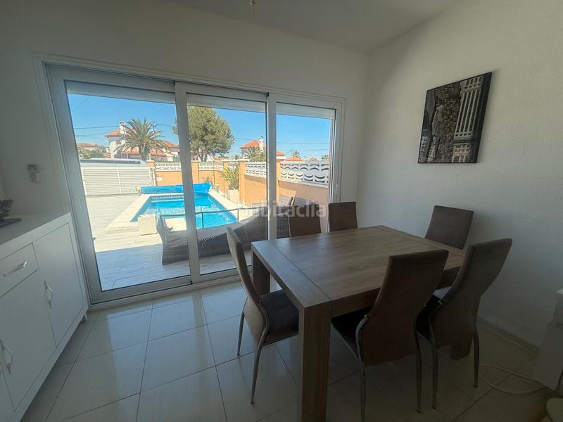 Foto 3fc75b83-dfb3-4643-8589-f11b15566193. Chalet with fireplace heating parking pool in Centre Miami Platja