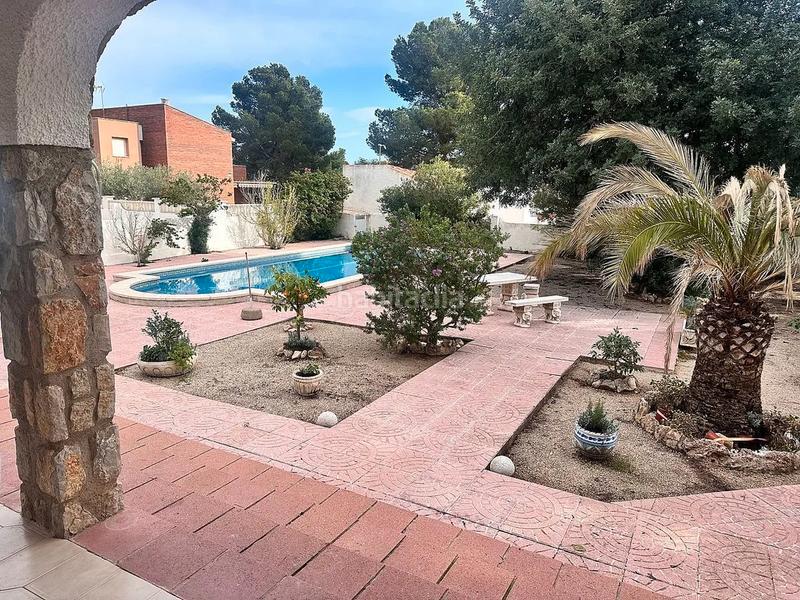 Foto a64c36bf-dab7-437a-99cc-4c2911e15634. Chalet con camino riscaldamento parcheggio piscina in Mont-roig del Camp