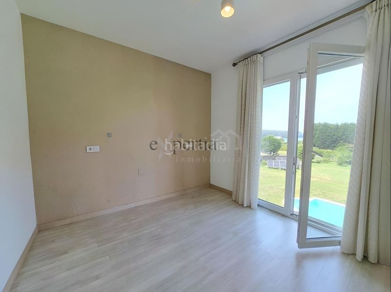 Foto 16d36a91-3b90-40e7-8b19-4c7211f12a8b. Casa amb calefacció aparcament a Boiro