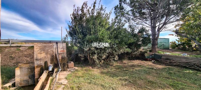 Foto e83265f2-fcb1-4389-92e2-27e22b6d84da. Mas avec cheminée chauffage dans Grau - Quintanes Amposta