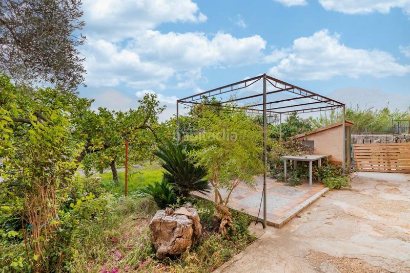 Foto 16ad4b64-c261-4fff-8cf0-b8e4199c1af6. Masia amb aparcament a Sóller