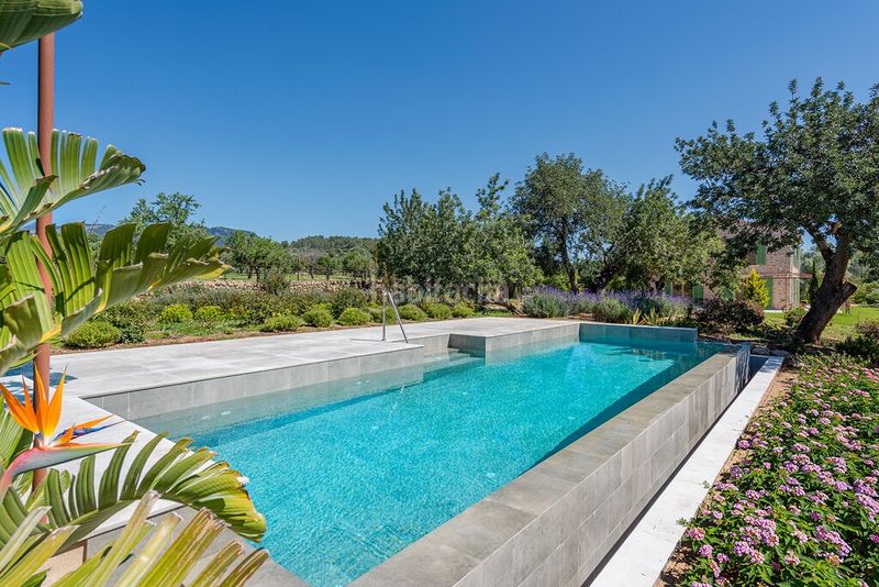 Foto 4be6bc6f-a26e-4b65-a398-74e92c212e53. Masia amb calefacció aparcament piscina a Alaró