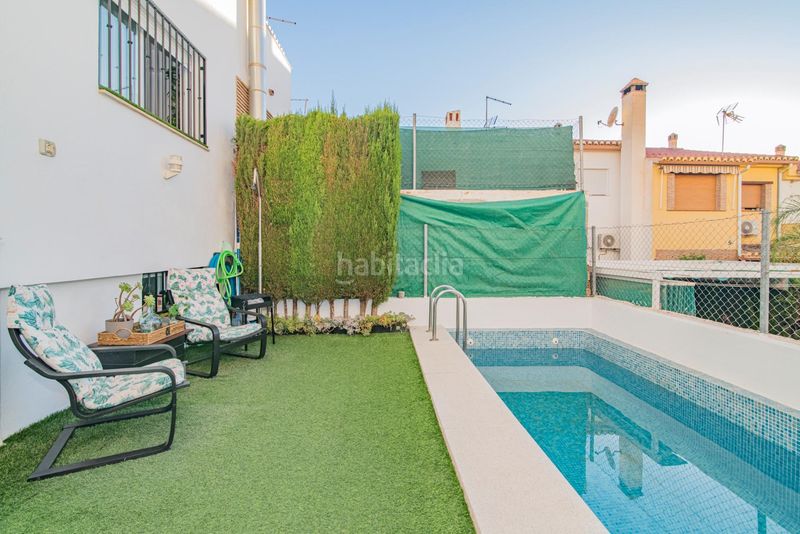 Foto 12a9db40-7835-4b26-ba5d-93986ffe4e85. Casa adossada amb calefacció aparcament piscina a Cájar