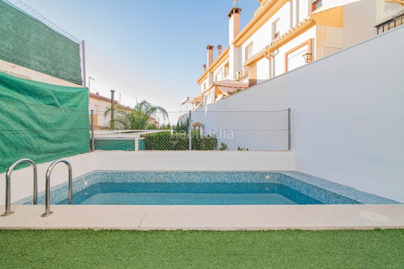Foto b5a42767-1864-4bf1-a478-1f7c8faae68f. Casa adossada amb calefacció aparcament piscina a Cájar
