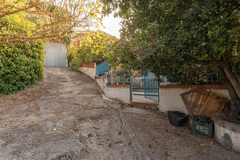 Foto f5b3682f-ae50-4480-9350-d1dd21ac9c6a. Xalet amb calefacció aparcament piscina a La Zubia Ciudad Zubia (La)
