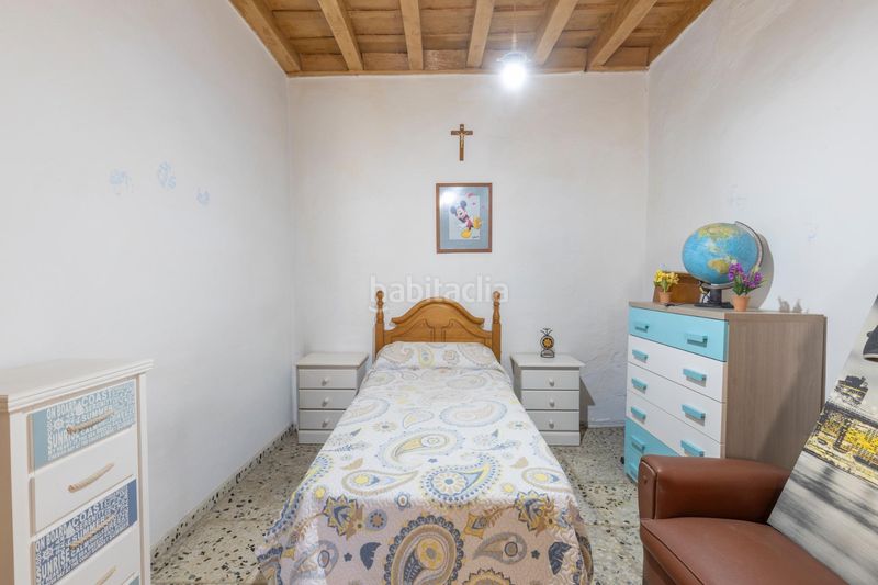 Foto c1b97181-c2a1-4b75-8d0a-c45f1d1b7d60. Casa adossada amb aparcament a La Zubia Ciudad Zubia (La)