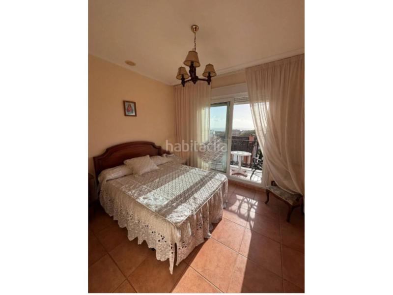 Foto 6dc7f713-d20e-4bde-b347-a590ea5b46b0. Casa aparellada amb calefacció aparcament a Sanxenxo pueblo Sanxenxo