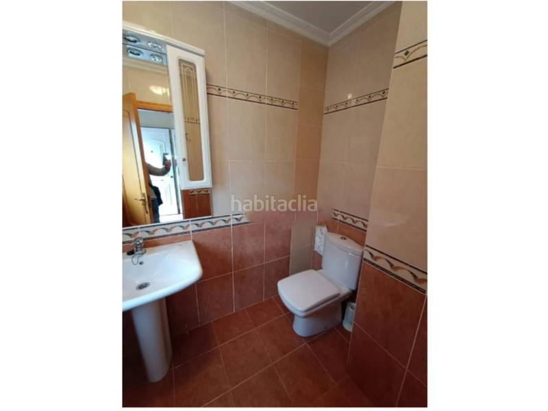 Foto 74058bdb-e5e7-419a-846a-6aa086a6ff84. Casa aparellada amb calefacció aparcament a Sanxenxo pueblo Sanxenxo