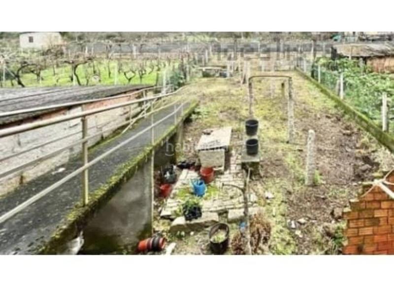 Foto 2a7abccf-fb30-4b4f-90a8-94b99258515f. Haus mit heizung parking in A Carballeira Ourense