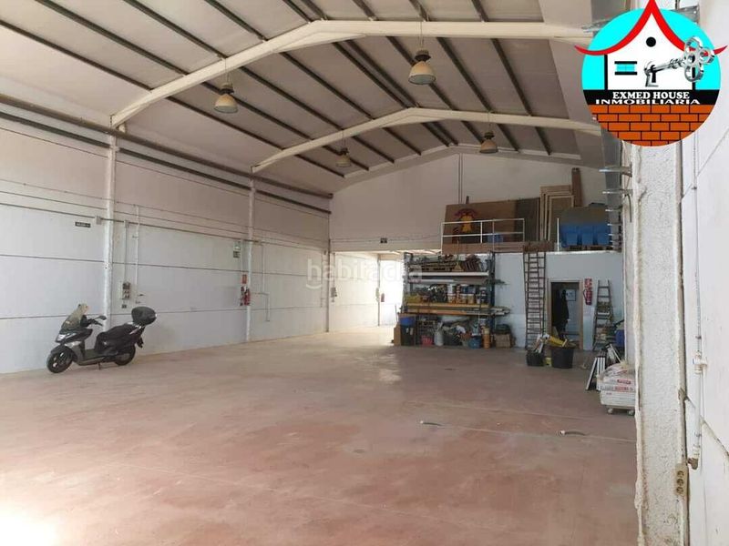 Foto bdef5241-3a96-4661-9fb1-2fd98b566dc5. Bâtiment à usage industriel dans Viator