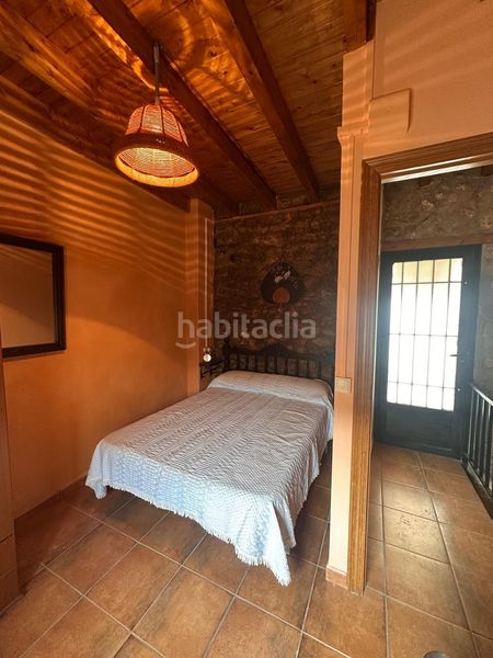 Foto 99b2f196-8dae-49a9-a4b6-e852ef5cea00. Casa adossada a Benlloc