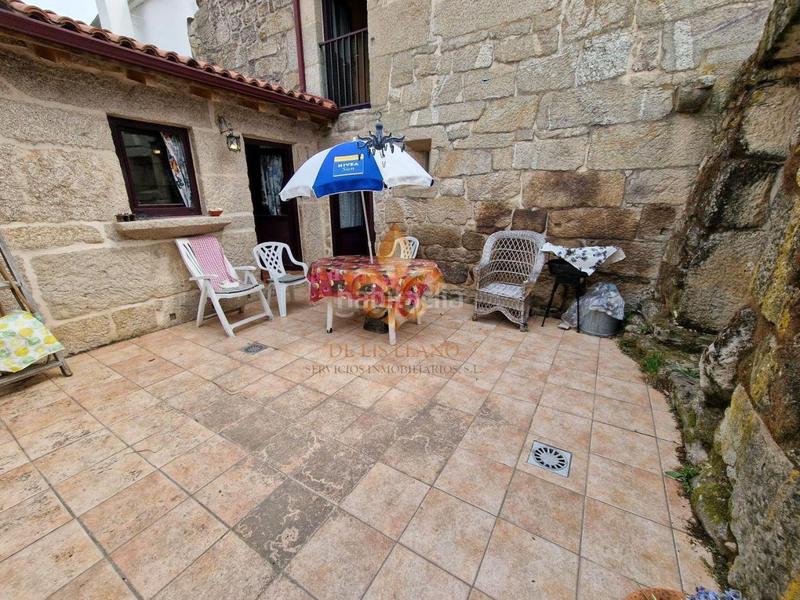 Foto 609f9493-152e-4573-886a-073d5ec7d006. Casa adossada a Maside