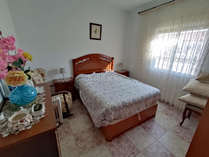 Foto d71470fc-934b-4871-9c48-b4098a44ba9c. Casa a schiera con riscaldamento parcheggio in Burguillos del Cerro