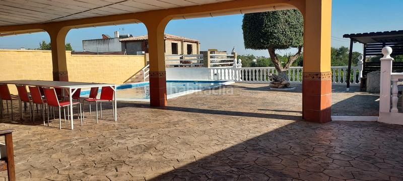 Foto 1e8105d2-9071-48dd-b3ed-af48193c2d62. Finca rústica terreno con casa en la puebla del rio en Puebla del Río (La)