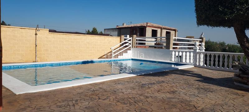 Foto c3a0335d-788e-42e7-9d98-7ab9973df8d8. Finca rústica terreno con casa en la puebla del rio en Puebla del Río (La)