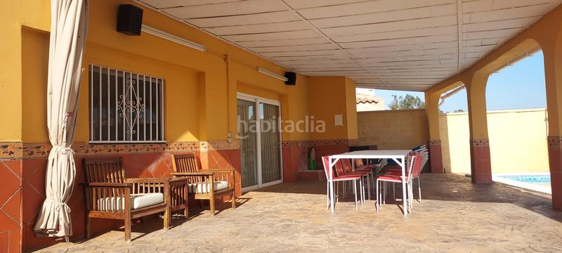 Foto dc8c1c20-1097-441c-86bf-1087efa88e28. Finca rústica terreno con casa en la puebla del rio en Puebla del Río (La)