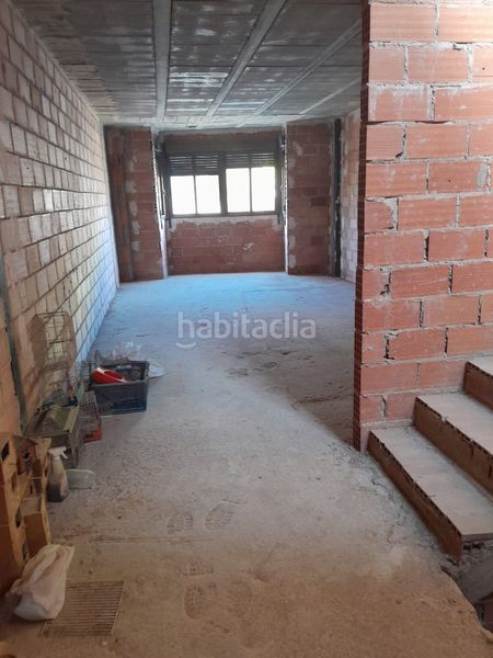 Foto 609ca506-ec5f-4866-aa4f-535c812cbf2e. Casa adosada casa en venta en vila-real a medio construir en Villarreal / Vila - real