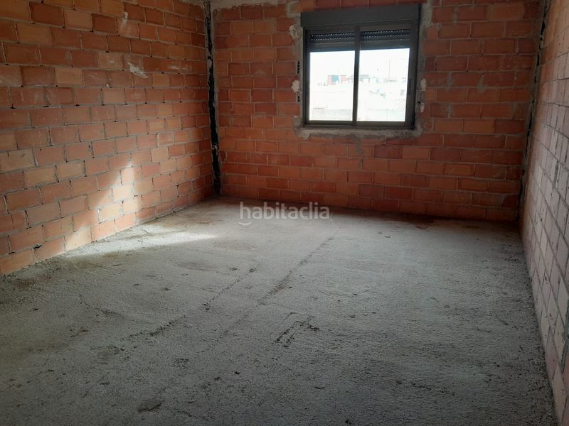 Foto c7b72993-5b29-460a-9bf6-b4776e7b8215. Casa adosada casa en venta en vila-real a medio construir en Villarreal / Vila - real