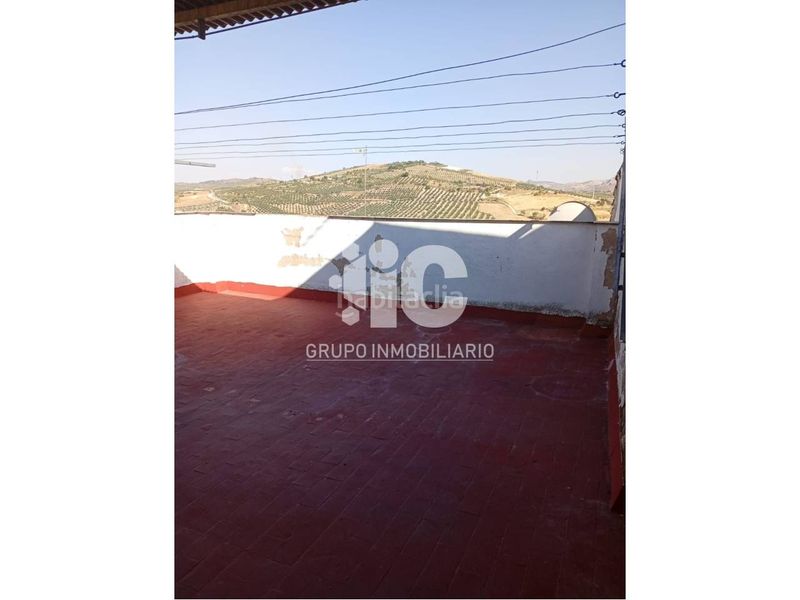 Foto d00be83f-d50a-4586-b055-42c01fcb874e. Edificio  compuesto de local comercial 2 pisos buhardilla terraza en Baena